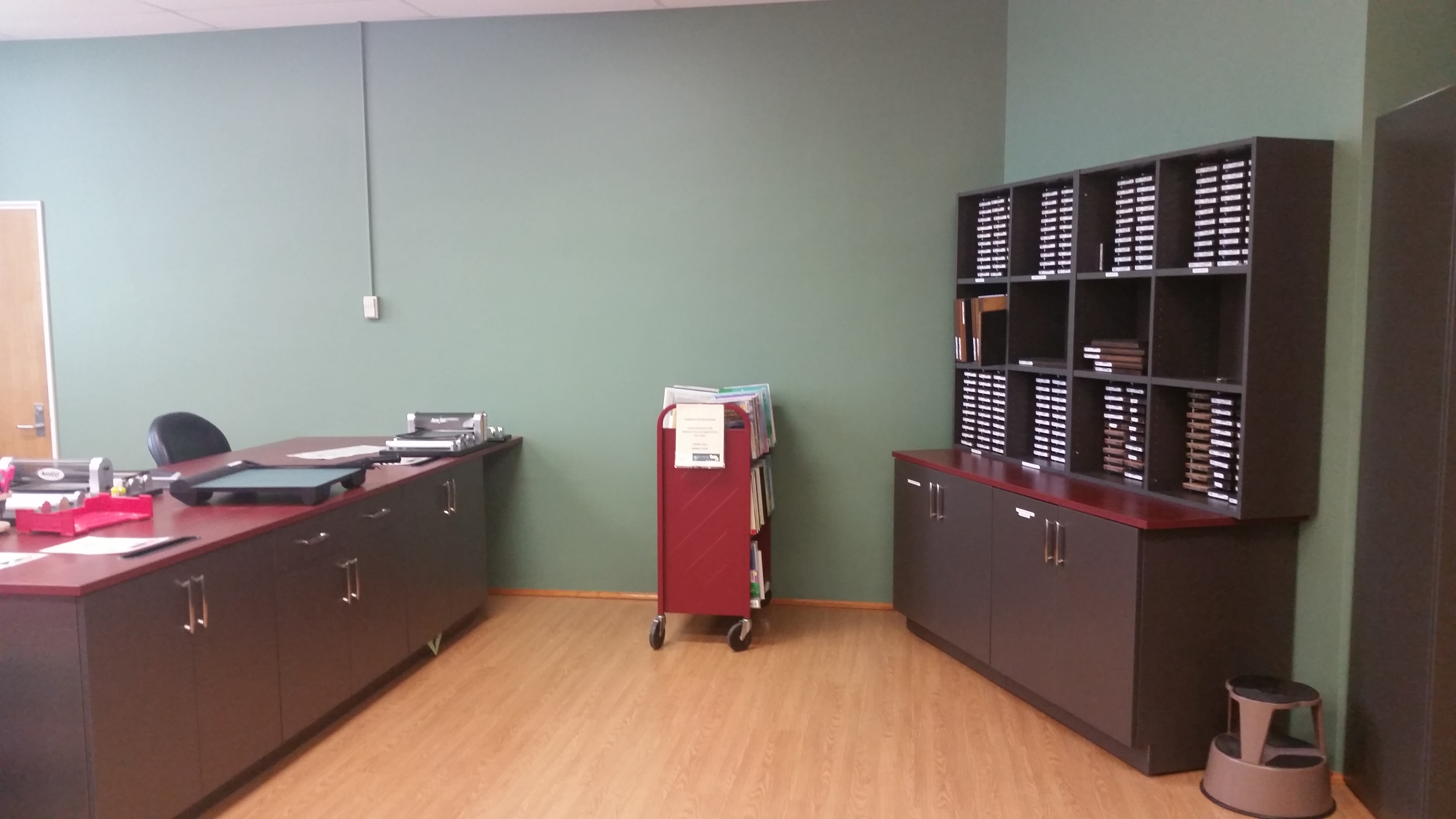 Books on a red cart in Nash 301