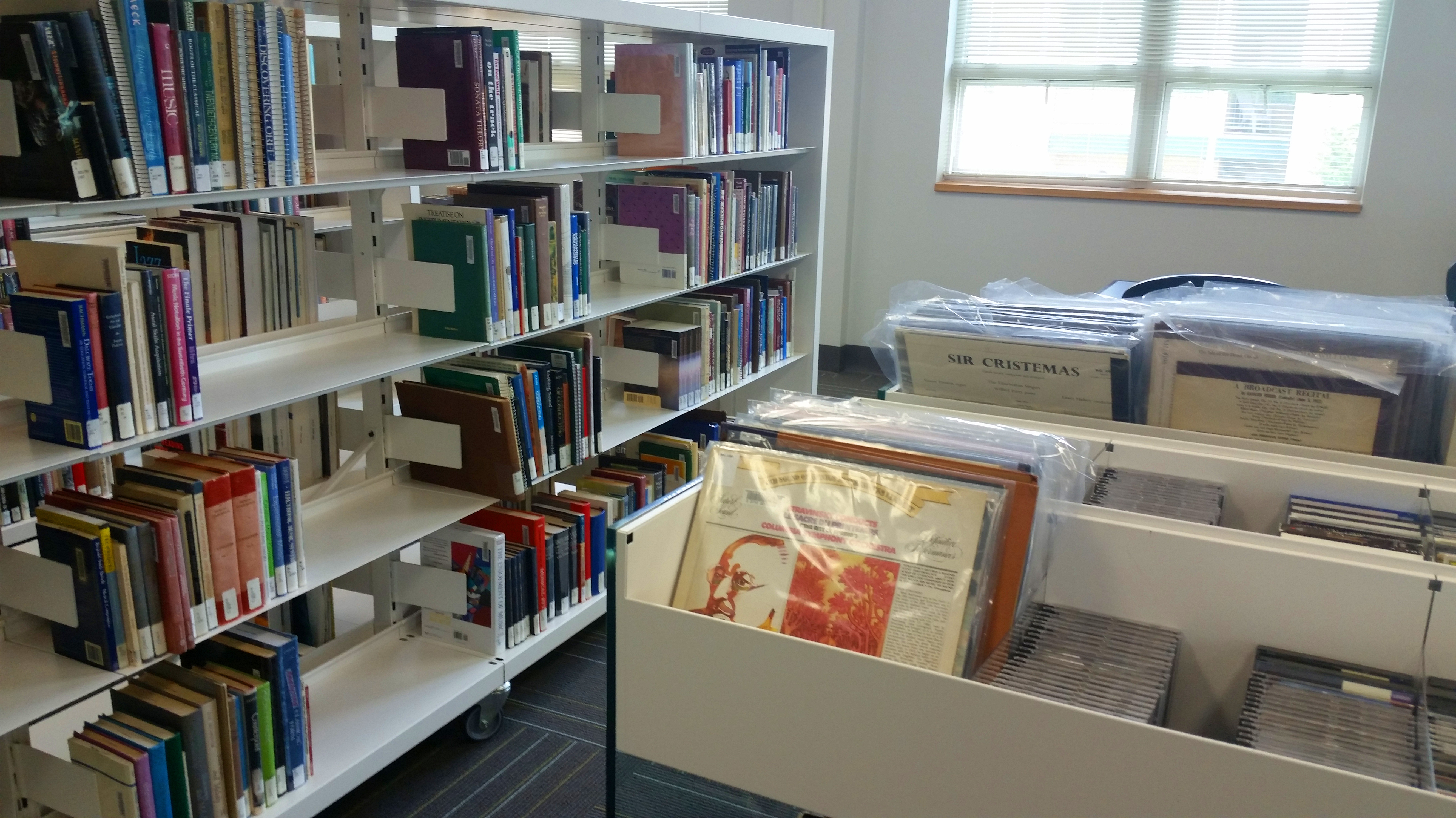 bookshelf and LP and CD cart in Music Pocket Library